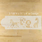 Wooden stencil with animal designs on a wooden surface