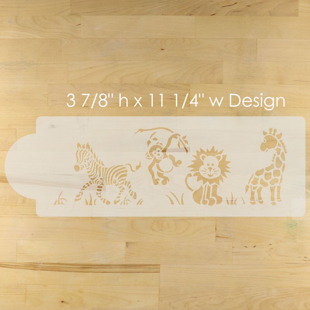 Wooden stencil with animal designs on a wooden surface
