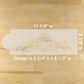 Decorative cake stenciled design on a wooden surface with measurements indicated.