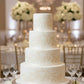 Decorative gold flourish design on a white background