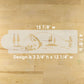 Cake stencil with fishing design and measurements on a wooden surface