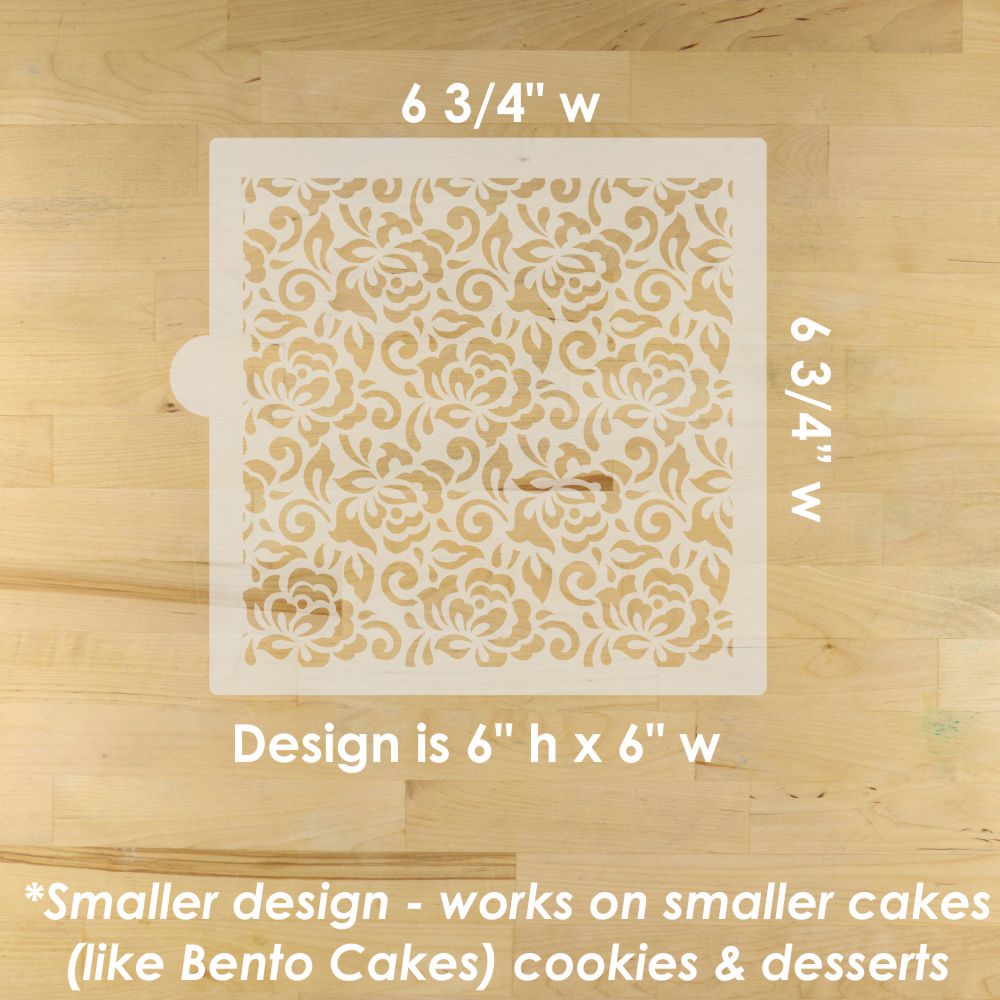 Rectangular cake board with pattern and dimensions on a wooden surface