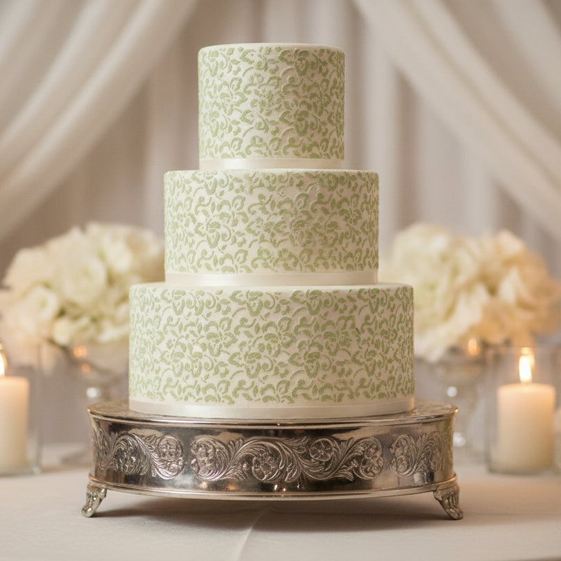Green floral pattern on a white background
