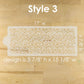 Decorative stenciled design on a wooden surface with measurements.