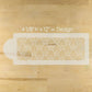 Rectangular cutting board with a geometric pattern on a wooden surface