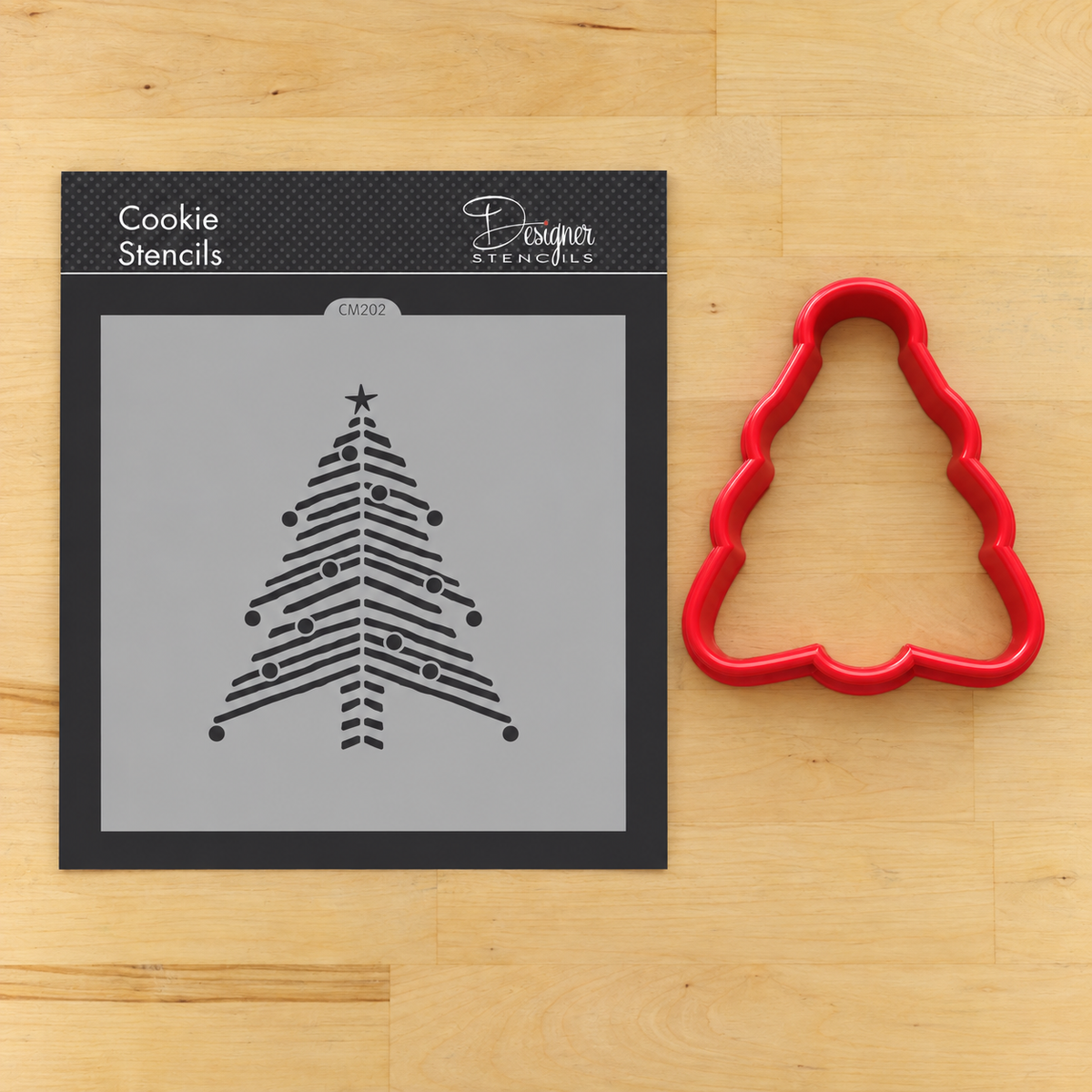 Chevron Christmas Tree Cookie Stencil in its packaging lying next to its matching cookie cutter