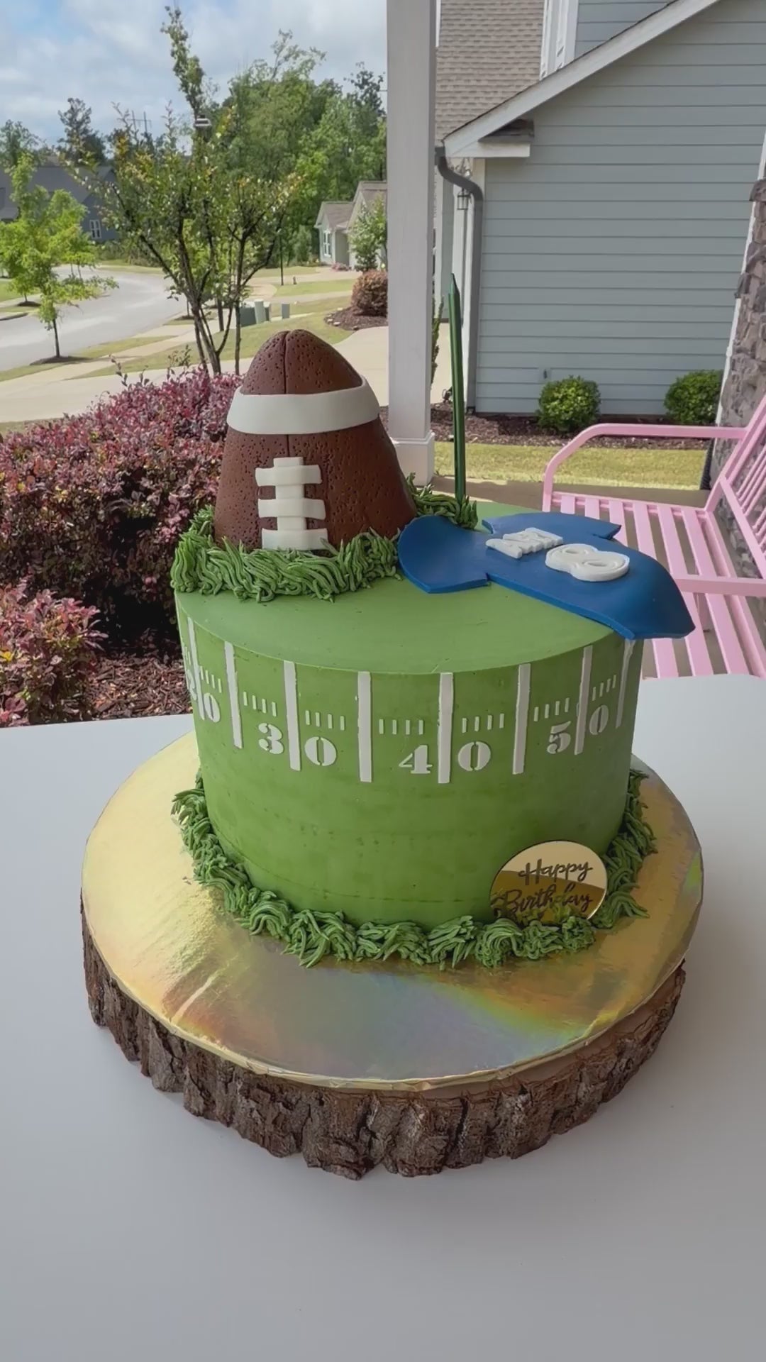 Video by Liz Betts showing off her cake using football cake stencils