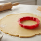 Nottingham Plaque Cookie Cutter being used on rolled out cookie dough