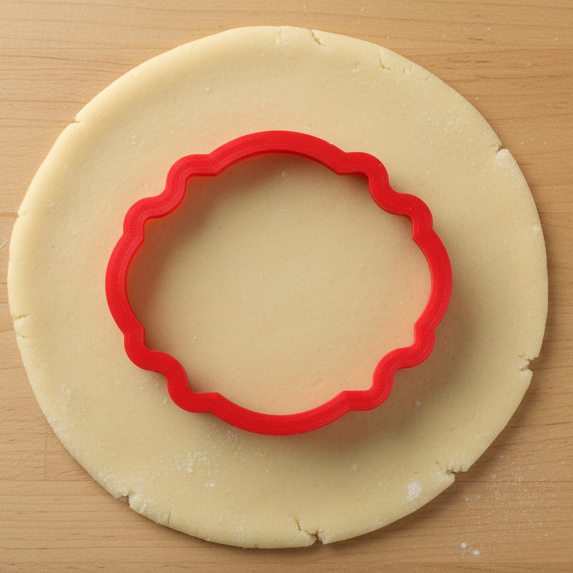 Barnes Plaque Cookie Cutter being used on cookie dough
