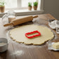 Leyton Plaque Cookie Cutter being used on rolled out cookie dough